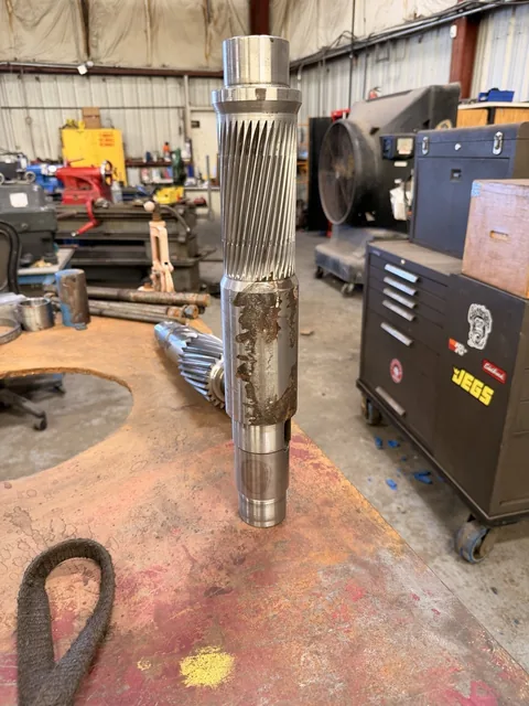 Second upright view of the pinion shaft and its shoulders.